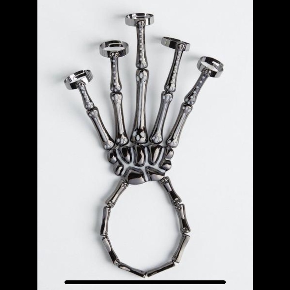 NWT torrid glow in the dark skeleton hand cuff bracelet